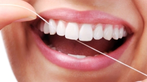 Heritage-dental-Flossing-the-teeth